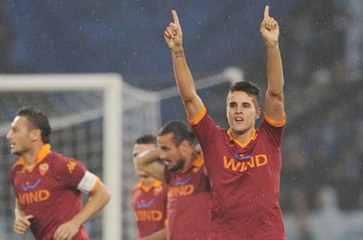 ve 6 maçta fileleri havalandırıp 8 gole ulaşan Roma'nın genç Tangocu Erik Lamela...