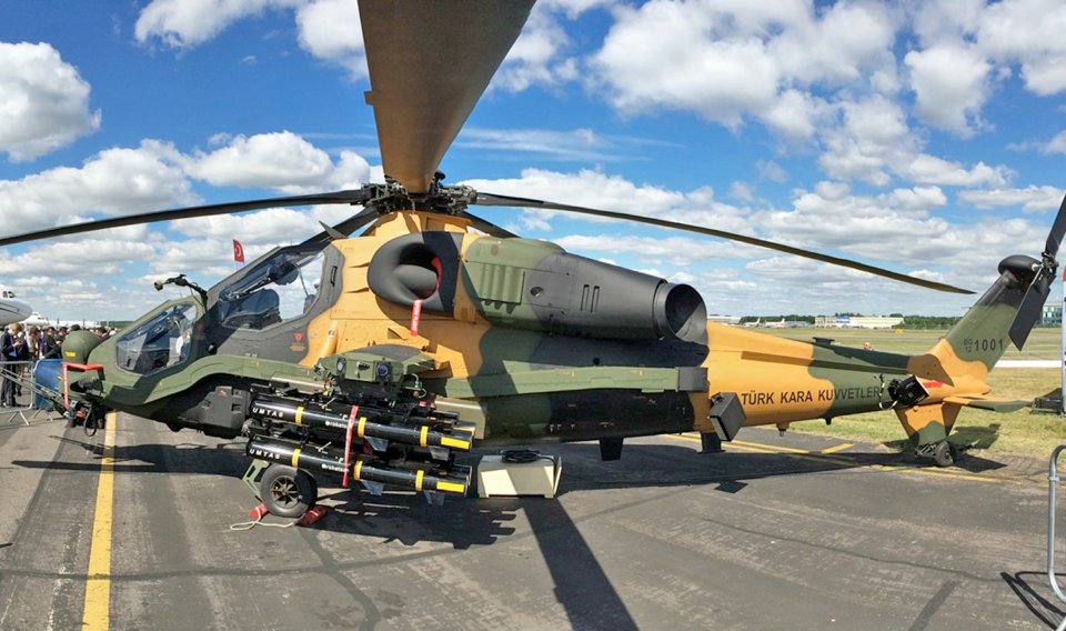 <p><span style="color:#FFFFFF"><strong>ATAK HELİKOPTERİ (T129)</strong></span></p>

<p>Yakın hava desteği görevleri ve çok amaçlı görevler için tasarlanmış olan T129 ATAK, ağır silah yükü ile zorlayıcı "sıcak hava-yüksek irtifa" görevleri için optimize edilmiştir. </p>
