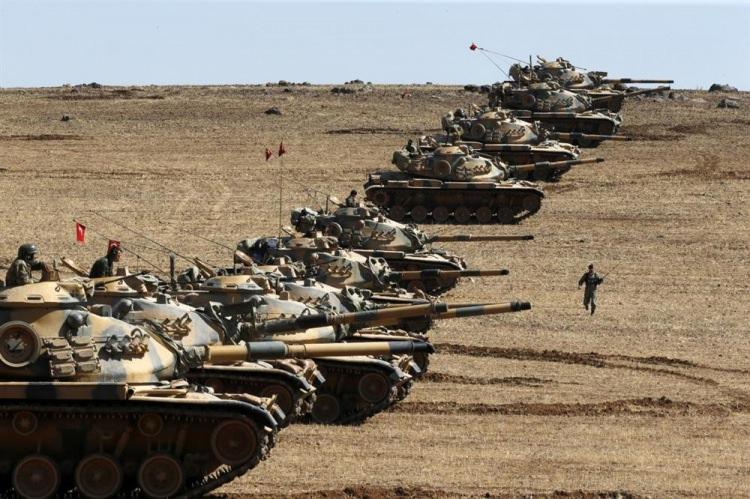 <p>Coğrafi olarak Afrin karasalından ayrık olsa da, Münbiç’te ABD ile diplomatik bir sonuca varılamaması Afrin harekâtının Münbiç’e sirayet et-mesine neden olabilir. ABD’nin Fırat Nehrin’in doğusundaki PKK/PYD varlığının konsolide halini muhafaza etme önceliğinden vazgeçmeyeceği göz önünde bulundurulduğunda, Münbiç’teki PKK/PYD varlığını sona erdirmesinin bu maksada hizmet edeceğinden söz edilebilir. </p>

<p> </p>
