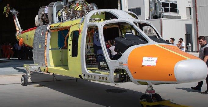 <p>Savunma Sanayii Başkanlığı koordinasyonunda Türk Havacılık Uzay Sanayii (TUSAŞ) tarafından yürütülen Özgün Helikopter Programı'nda bir süredir devam eden tasarım ve üretim faaliyetlerinde önemli bir aşamaya gelindi.</p>
