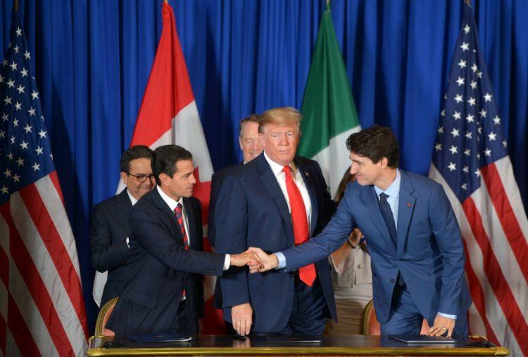 <p>Trump, Meksika Devlet Başkanı Pena Nieto ve Kanada Başbakanı Justin Trudeau görüşmesi</p>