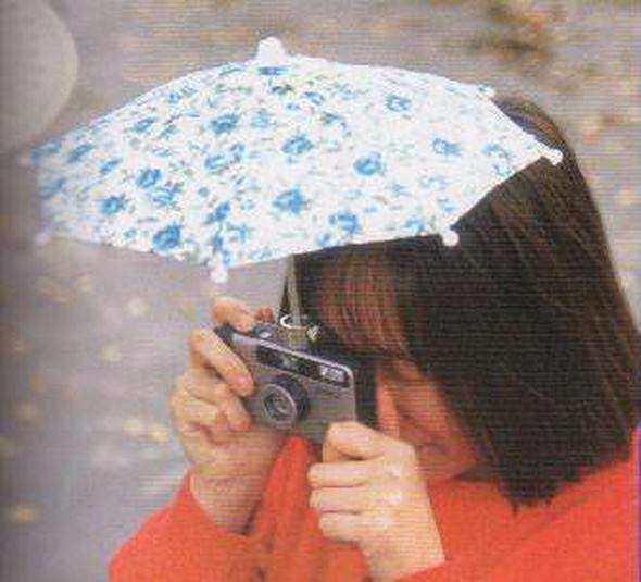 <p>Yağmurlu havalarda fotoğraf makinenizi koruyan şemsiye...</p>
<p> </p>