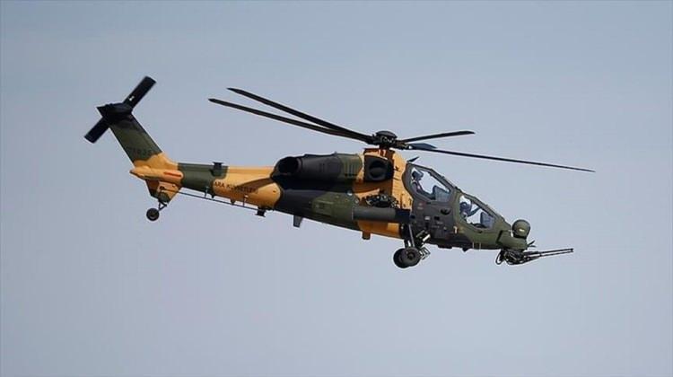 <p><strong>ATAK'A YERLİ TOP GELİYOR</strong><br />
<br />
TUSAŞ tarafından üretilen ve Pakistan ile imzalanan ihracat sözleşmesinin ardından Latin Amerika ülkelerinin de dikkatini çeken yerli Ağır Sınıf Taarruz Helikopteri ATAK'ın burun kısmında yer alan 20 mm'lik toplar, artık Türkiye'de üretilecek.</p>