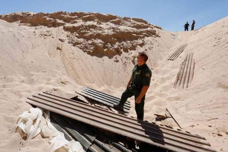 <p>ABD Sınır ve Gümrük Muhafaza Birimi yetkilileri, Arizona eyaletinde devam eden bir soruşturma kapsamında yapımı henüz tamamlanmamış olan ve Meksika ile sınır geçişi sağlayan bir tünel keşfettiklerini duyurdu.</p>

<p> </p>
