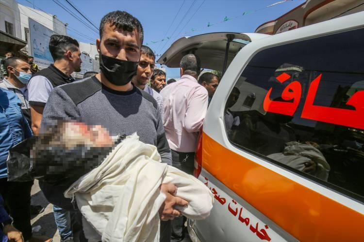 <p>İsrail'in Gazze Şeridi'ne düzenlediği saldırılarda 5 Filistinlinin daha hayatını kaybetmesiyle şehit sayısı 124'e yükseldi. </p>
