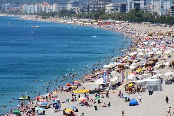 <p>Kısıtlamasız ilk pazar günü Konyaaltı Sahili doldu</p>

<p>Antalya'da kısıtlamasız ilk pazar gününde Konyaaltı Sahili'nde, sabahın erken saatlerinde yoğunluk oluştu. Güzel havanın etkisiyle birlikte sahile gelenler, denizin ve güneşin tadını çıkardı.</p>
