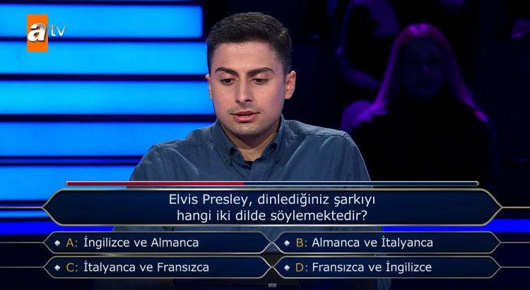 <p><span style="color:#800080"><strong>Amerika'da okuyan yarışmacı üçüncü etapta karşısına çıkan "Elvis Presley dinlediğiniz şarkıyı hangi iki dilde söylemektedir?" sorusunda zorlu anlar yaşadı.</strong></span></p>
