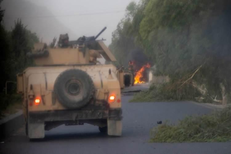 <p>13 Temmuz’da Afganistan'ın Kandahar vilayetinde bir kontrol noktasında Taliban ile şiddetli çatışmalar sırasında Afgan Özel Kuvvetlerine ait Humvee'lerin imha edildiği görülüyor.</p> <p> </p> 