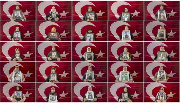 <p>Dağa kaçırılan çocuklarına kavuşma ümidiyle HDP il binası önünde oturma eylemi yapan Diyarbakır anneleri, kadınları 8 Mart Dünya Kadınlar Günü'nde teröre karşı birlik olmaya çağırdı.</p>
<p> </p>