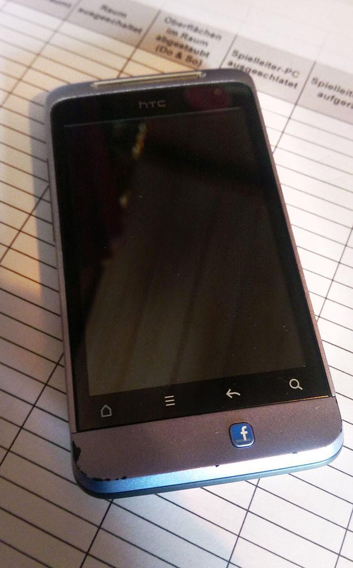 <p>Telefon ve onun anlamsız butonu</p>