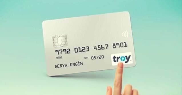 <p>Bankacılık yetkilileri, TROY kart için bankalara olan talebin son haftalarda hız kazandığını belirterek, gerek yeni kart gerekse kart değişiminde TROY logolu kartlara olan talebin gelecek günlerde daha da artmasının beklendiğini kaydetti.</p>
