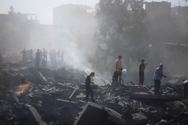 <p><em><span style="color:#B22222"><strong>İsrail'in Gazze'yi işgalinde 7 Ekim sonrası</strong></span></em></p>

<p>Hamas'ın silahlı kanadı İzzeddin el-Kassam Tugayları, "Filistinlilere ve başta Mescid-i Aksa olmak üzere kutsal değerlere yönelik sürekli ihlallere karşılık verme" gerekçesiyle İsrail'e 7 Ekim 2023'te kapsamlı saldırı düzenledi.</p>
