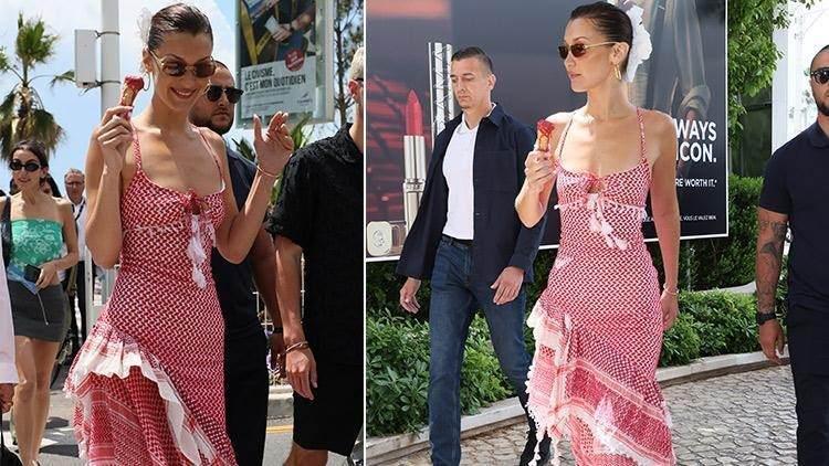 <p><strong> Bella zarafet ve güzelliğinin yanında Cannes'de tercihiyle moda ve tüm dünyaya sözsüz, slogansız bir mesaj iletti.</strong></p>

<p><strong>Masum insanların zamanla unutulduğu trajedisini kırmızı halıda Filistin kefiyesinden ilham alınan elbisesiyle gösteren Bella, siyasi konulara değinmeden gösterişli ve dikkat çekici bir şekilde değindi.</strong></p>
