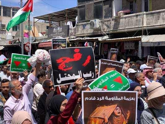 <p><strong>ÜRDÜN</strong></p>

<p>Ürdün'de İsrail'in Gazze Şeridi'ne ve güneydeki Refah kentine saldırılarını protesto için gösteri düzenlendi.</p>

<p> </p>
