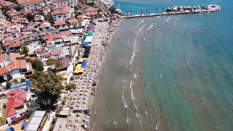 <p>Su parkları ve sporları istasyonlarında da yoğunluk gözlenirken, turistler, su sporları istasyonlarında jet ski ve deniz paraşütüyle heyecanlı dakikalar yaşadı.</p>

<p>​</p>
