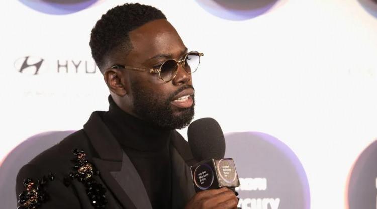 <p><span style="color:#B22222"><em><strong>Netflix'in pop&uuml;ler dizisi "Supacell" ile geniş kitlelere ulaşan İngiliz rap&ccedil;i ve oyuncu Ghetts, bir gencin &ouml;l&uuml;m&uuml;ne neden olduğu trafik kazasında su&ccedil;unu kabul etti. &Uuml;nl&uuml; ismin cezası 12 Şubat'ta a&ccedil;ıklanacak.</strong></em></span></p>
