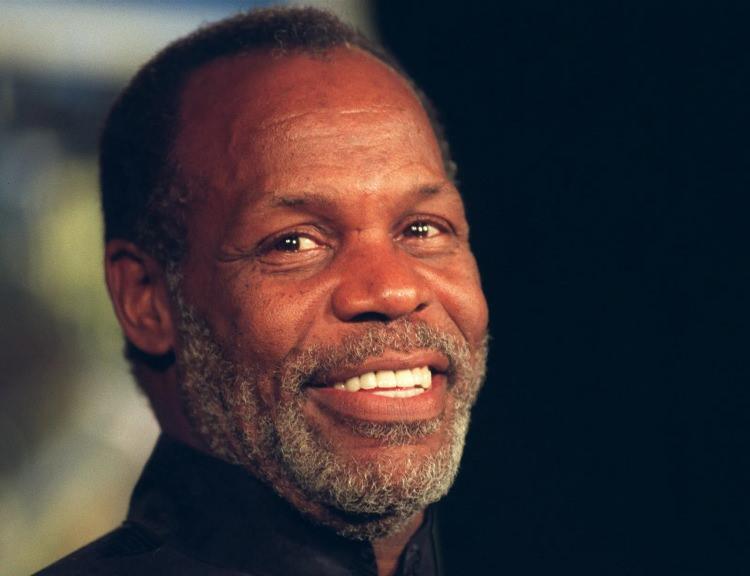 <p><span style="color:#B22222"><strong>DANNY GLOVER</strong></span></p>

