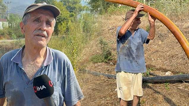 <p>Muğla'nın Fethiye il&ccedil;esi İnlice Mahallesi'nde yaklaşık 20 saattir devam eden orman yangınında, <span style="color:#A52A2A"><strong><em>Nazmi Kundak&ccedil;ı (76)</em></strong></span> g&ouml;sterdiği fedakarlık dikkat &ccedil;ekti. Kundak&ccedil;ı, kendi kurduğu sistemle saatlerdir yangın b&ouml;lgesine su taşıdı.</p>
