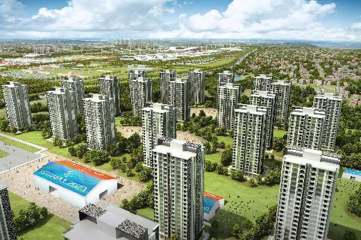 Olimpik Şehir Kümesi... Bu küme, Oyunlar için dinamik ve canlı bir arka plan sağlamak üzere tasarlandı. Spor tesisleri, İstanbul Olimpik Park Tesis Alanı boyunca, izleyicileri hem gerçek anlamda, hem de görsel açıdan çekecek önemli birer merkez olacak şekilde bilinçli olarak konumlandırıldı. Kümenin mimarisi ve peyzajı hem düzenlenen etkinliğin heyecanını hem de Türkiye’nin sahip olduğu kültürel ve sanatsal güzellikleri yansıtacak. İzleyici dolaşım alanının doğu kenarı, tesis alanı ve bu alanın arkasında kalan doğal vadi manzarası arasında bir süreklilik oluşturacak şekilde, izleyiciler için özel olarak tasarlandı.