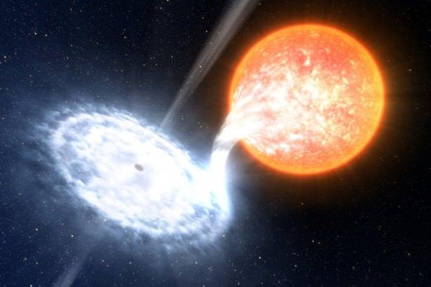 <p>Dünya'dan 8 bin ışık yılı uzaklıktaki bir karadeliğin sıradışı hareketleri astronomların kafasını karıştırdı.<br />
<br />
Bir yıldızı yuttu, nasıl harekete geçtiği bilinmiyor!</p>
