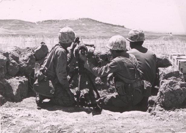 <p>Komandolar Geri Tepmesiz Topla Düşmana Ateş Açarken</p>
<p> </p>