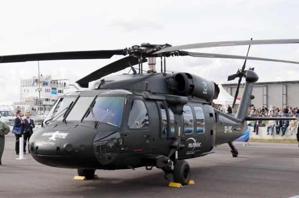 <p><span style="color:#E6E6FA">Dünyanın sayılı helikopter üreticilerinden Sikorsky firmasının S70i Black Hawk helikopterindeki sayısal kokpit göstergelerini ve temel aviyonik sistemlerini ASELSAN’a emanet etmesi, şirketin uluslararası alanda kabul gören bir aviyonik ekipman sağlayıcısı olduğunun en büyük kanıtını oluşturabilir.</span></p>
