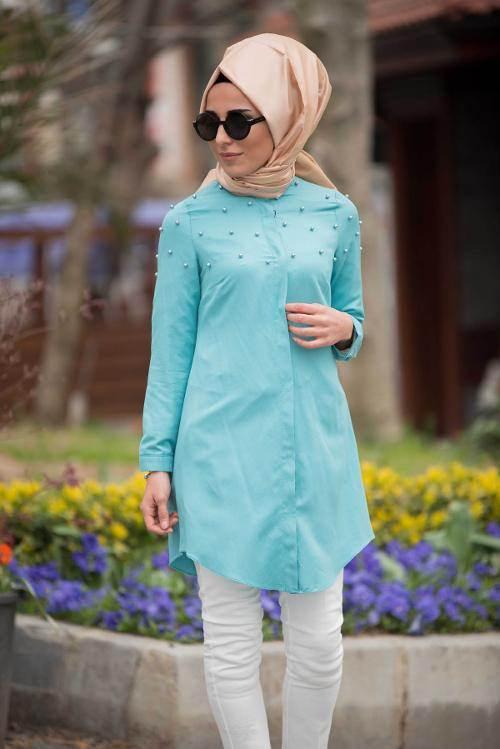 <p>Genç tesettürlü kadınların yaz mevsimlerinde cıvıl cıvıl görünebileceği turkuaz gömlekler,</p>
