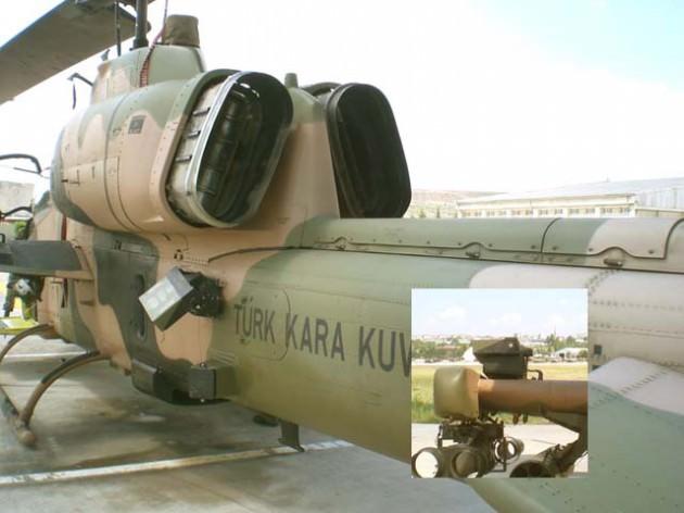 Gri renkte teslim edilen helikopterler, Ankara Güvercinlik'te kamuflaj renklerine boyandı.