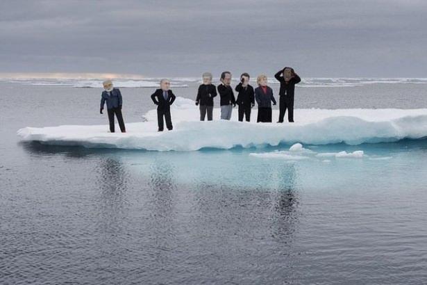 <p>Greenpeace üyeleri devlet başkanlarının kafalarını giydiği bir fotoğraf</p>

<p> </p>
