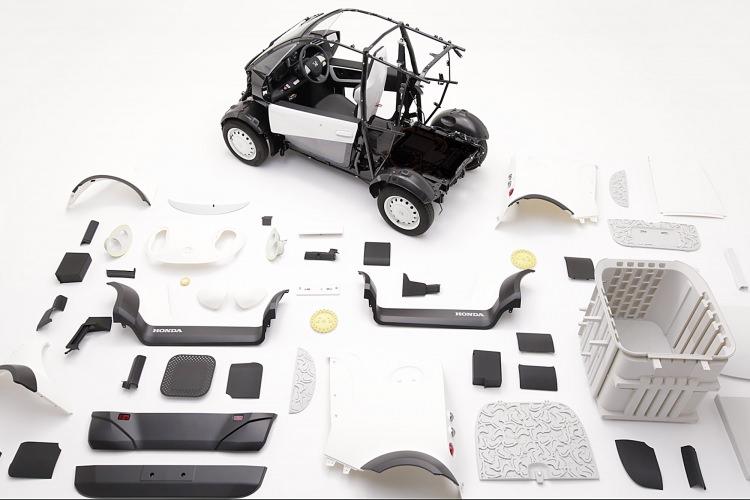 <p><span style="color:#D3D3D3">Dar sokaklarıyla bilinen Kamakura kentinde görev yapması planlanan araç tek kişilik ve arkasında da sadece küçük bir kargo bölümü barındırıyor. </span></p>