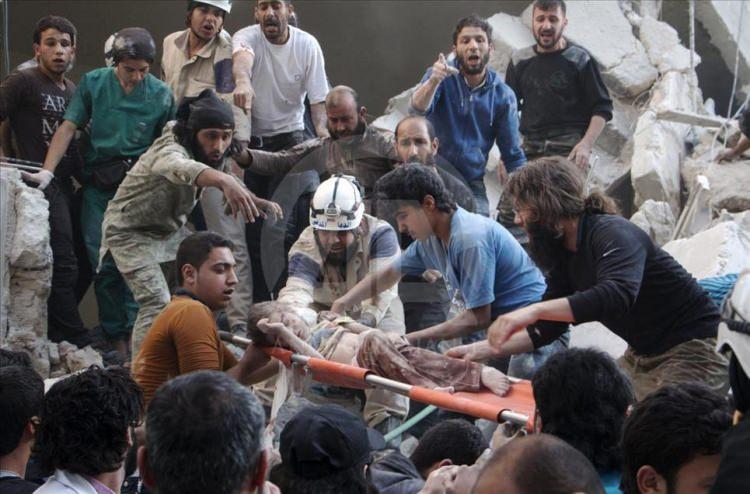 <p><span style="color:#FFFFFF">AFP foto muhabiri Karam Al-Masri, ''Hava saldırıları altında Halep'' başlıklı fotoğraflarıyla ''seri haber" kategorisinde üçüncülük ödülüne layık görüldü. <strong>( Karam Al-Masri / AFP - Anadolu Ajansı )</strong></span></p>
