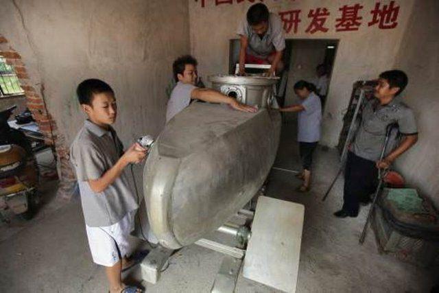 <div>Yaklaşık 4 metre uzunluğunda ve 2 metre yüksekliğindeki "Shuguang Hao" isimli denizaltı, suyun 20 metre altında saatte 20 kilometre hızla yaklaşık 10 saat aralıksız gidebiliyor.</div>

<div> </div>
