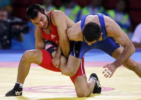 2008 PEKİN OLİMPİYAT OYUNLARI Ramazan Şahin    (66-Serbest)    Altın Nazmi Avluca    (84-Grekoromen)    Bronz 
