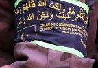 Özel harekat polisinin kolundaki ayet