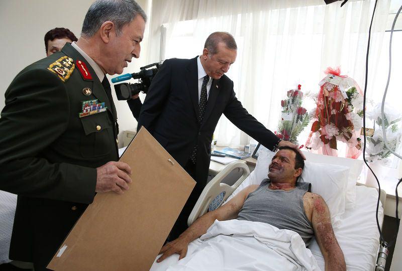 <p>Binbaşı Tetik, Silopililerin tahliyesi sırasında üşüyen çocuğun elini nefesiyle ısıtmıştı.</p>

<p>Erdoğan'ın GATA'da diğer gazileri de ziyaret etmesi bekleniyor.</p>
