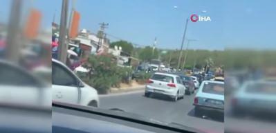  Bodrumlu vatandaştan kalabalığa g&uuml;l&uuml;mseten tepki : "Evinizde oturugosenize"