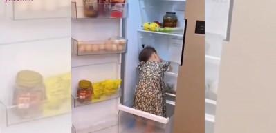 Sıcak havalara dayanamayan bebek buzdolabına girdi!
