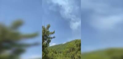 Yeni başlayan yangına helikopterler anında m&uuml;dahale etti