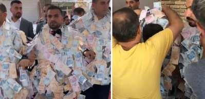 Aşiret d&uuml;ğ&uuml;n&uuml;nde damada takılan para şoke etti