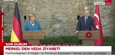 Merkel'in 'koalisyon' s&ouml;zlerine Erdoğan'dan g&uuml;l&uuml;mseten cevap: Bana şikayet ediyordun