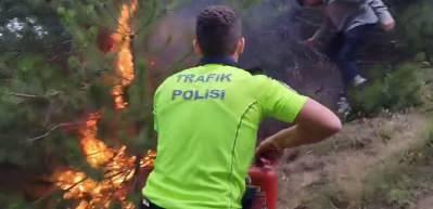 Uygulama yapan polislerin dikkati orman yangınını önledi