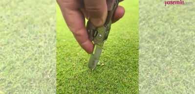 Golf sahasında &ccedil;ıkan yabani otun ayıklanma s&uuml;reci şaşırttı!