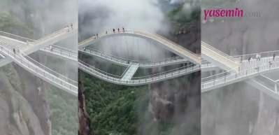 Bu köprüden geçmek cesaret ister! Çin'deki bükülebilir cam köprü görenlerin nefesini kesiyor...