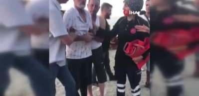 Sahildeki acı bekleyiş mutlu sonla bitti: Boğuldu sandığı oğlunu g&ouml;zyaşlarıyla b&ouml;yle kucakladı