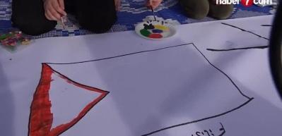 Yetim Vakfı'nın etkinliğinde Filistin i&ccedil;in 1 kilometre uzunluğunda resim yapıldı