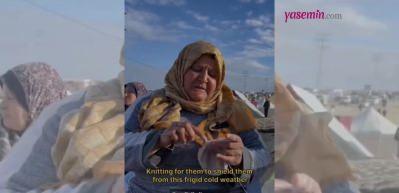 Gazze'deki çocuklar için kıyafetleri söküp çorap ve bereler örüyor! 