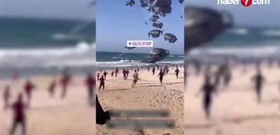 &Ouml;ld&uuml;rtt&uuml;kleri a&ccedil; bıraktıkları Gazzelilere havadan yardım attılar