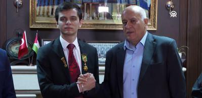 Zulme karşı tepkisiz kalmayan milli sporcumuza Devlet madalyası verildi