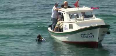 &Uuml;sk&uuml;dar'da deniz dibi temizliğinde cep telefonu ve tarihi eser &ccedil;ıkarıldı