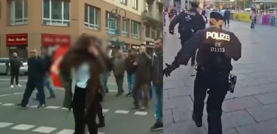 T&uuml;rk bayrağının yakılışı seyreden Alman polisi Filistin bayrağı taşıyan &ccedil;ocuğu g&ouml;zaltına aldı